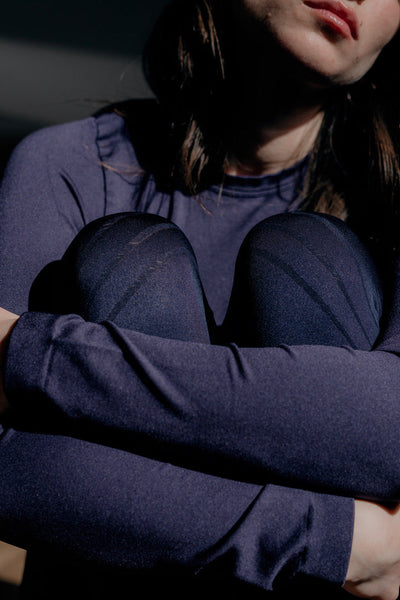 Woman wearing Eclipse PRISM activewear Woman wearing Eclipse PRISM activewear