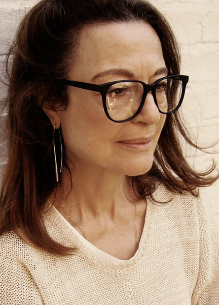 Woman wearing black PRISM New York glasses Woman wearing black PRISM New York glasses