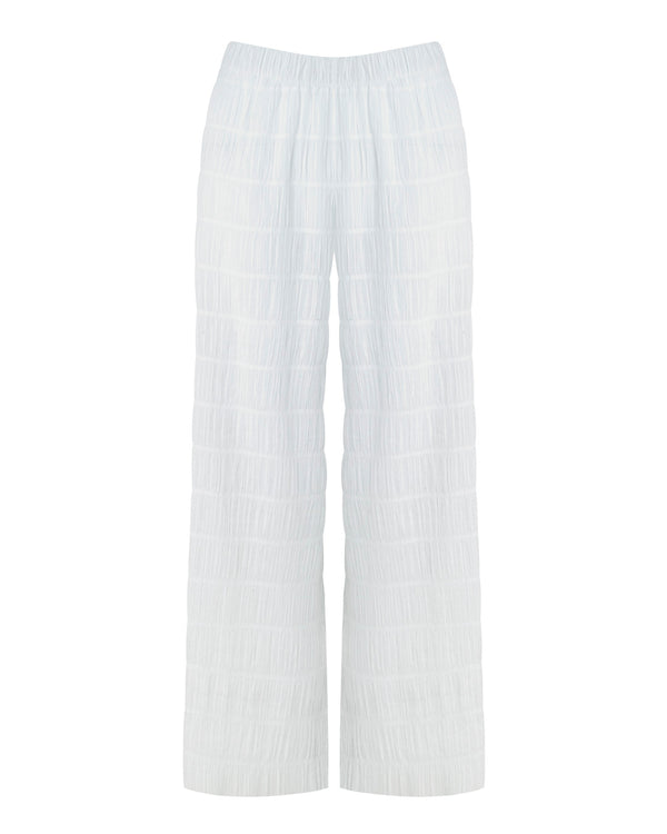 ATHENS - White Rouched. These are a pair of high-waisted trousers featuring a comfortable thick elastic waistband for easy everyday wear. The loose fit provides comfortability and easy wear, skimming the natural shape of the body with a slightly cropped leg. 