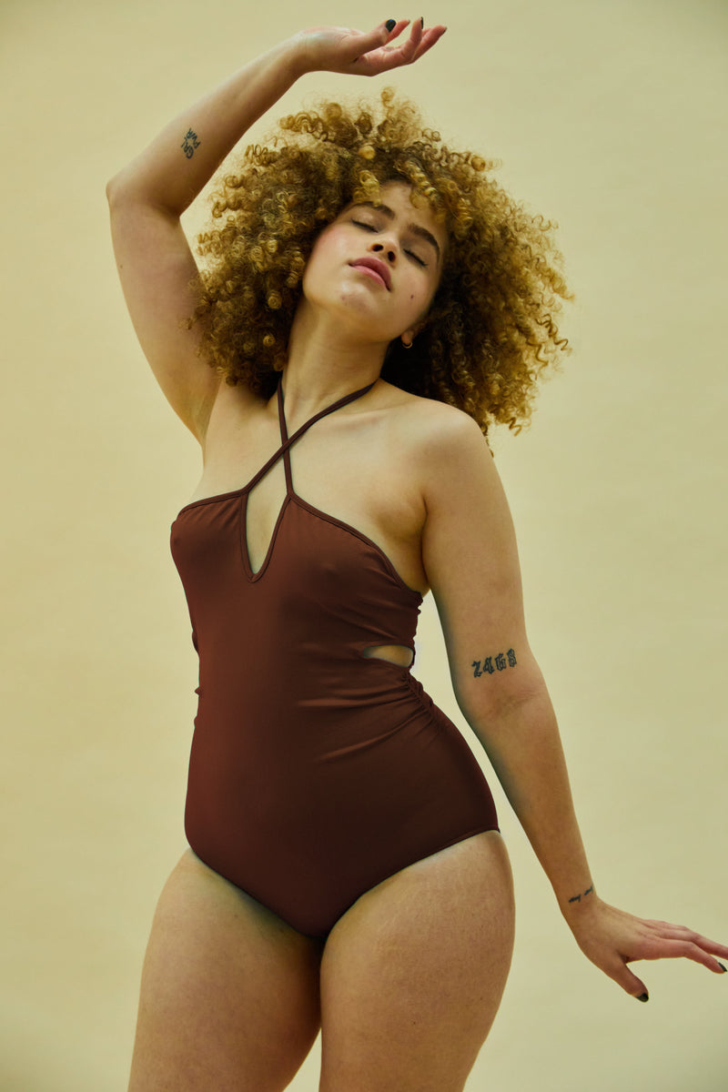 Model wears Immersed | One-Piece Swimsuit with cut outs | Maroon | Tummy Control Swimwear | swimsuit to hide belly | Supportive bathing suit | Plus size swimwear | PRISM²