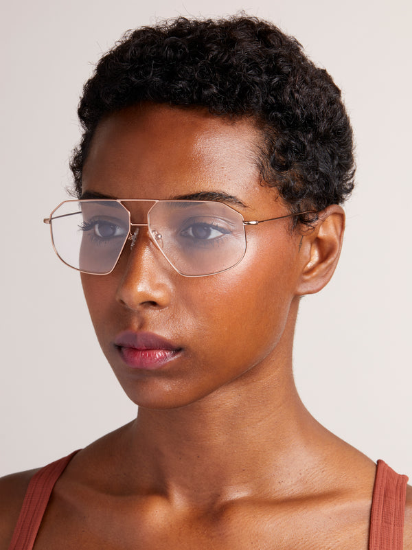 SANTIAGO OPTICAL - Rose Gold. Contemporary interpretation of the retro aviator frame. 4mm rims and a double bridge, perfect unisex frame. Ultra lightweight stainless steel frames, pink gold finish. Adjustable silicone nose pads, for comfort.