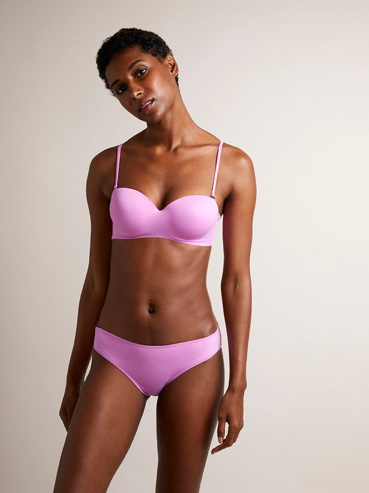 MONTAUK - Magenta. Features moulded cups w/ underwiring & built in padding for additional support w/ subtle lift. Straps are adjustable and removable.