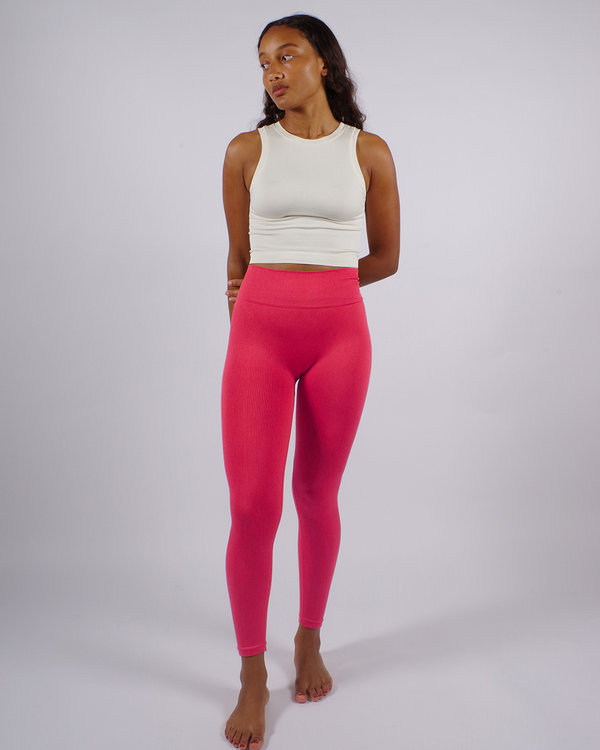 model wears ribbed awaken high waisted pink cerise leggings - prism2 london