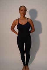 Model wears BALANCED - Black - PRISM² - Womens unitard -  Curvy women playsuit - activewear unitard - black unitard - plus size unitard