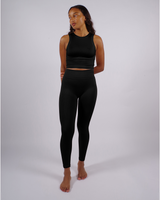 model wears ribbed black compression leggings 