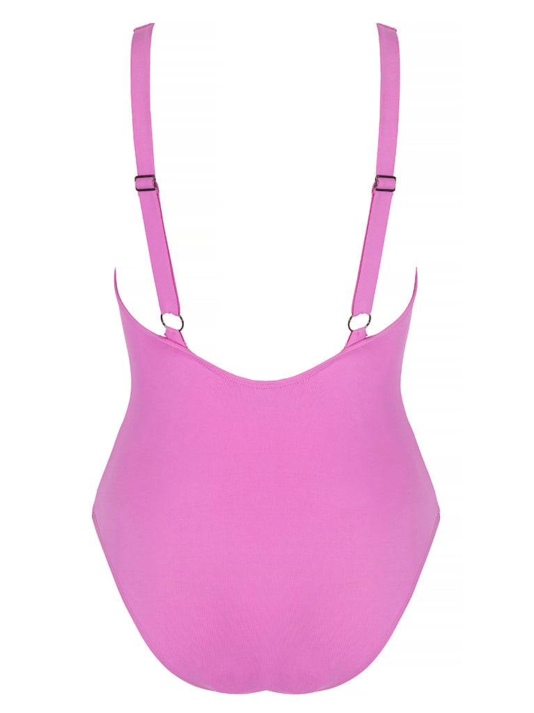 LIPARI - Magenta. Swimsuit with adjustable shoulder straps and v-neck featuring a tie front knot to slim the silhouette.