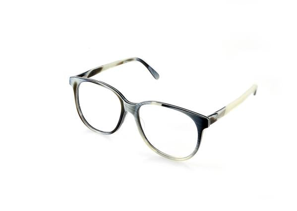 NEW YORK Optical - Zebra Horn. A PRISM classic - unisex collection staple is a medium sized square style frame with a flat top and curve bottom. Also available in sunglasses.