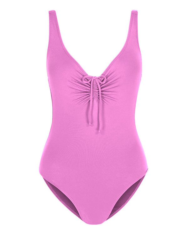 SHELTER ISLAND - Magenta. This is a simple yet sexy one-piece swimsuit. With a high cut leg, scoop neckline feature and adjustable gathered detail with tie and thin shoulder straps. The back scoop low with a gathered detail and tie to match the front. Fully lined lightweight matte swim fabric. 
