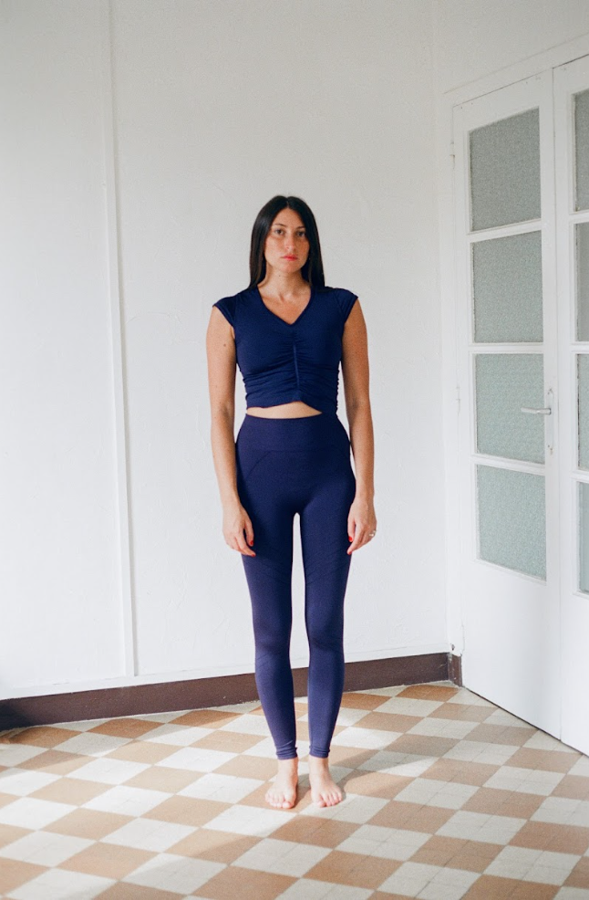 model wearing lucid leggings in navy - plus size women leggings - supportive activewear leggings - shaping leggings - compression leggings - seamless leggings - sustainable brand - ethical leggings - PRISM²
