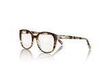 TOKYO Optical - Amber & Cream Tortoiseshell. The frame is futuristic yet simple, lightweight medium to small style size - w/ rounded edges make it suitable for all face shapes.