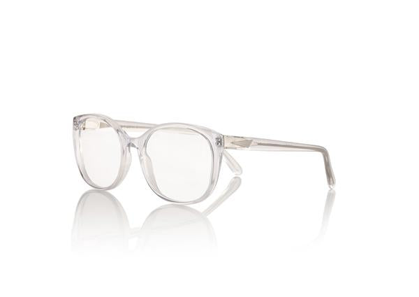 TOKYO Optical - Clear. The frame is futuristic yet simple, lightweight medium to small style size - w/ rounded edges make it suitable for all face shapes.