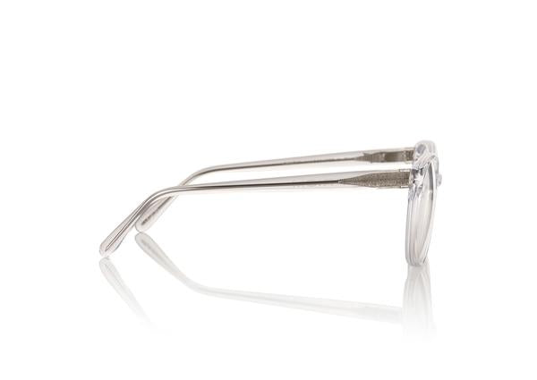 TOKYO Optical - Clear. The frame is futuristic yet simple, lightweight medium to small style size - w/ rounded edges make it suitable for all face shapes.