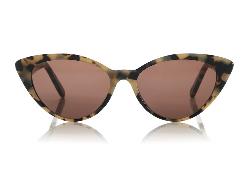 ACCRA - Empathy in cream tortoiseshell. A modern elegant take on the classic cat-eye with rounded edges and elongated tips. Lightweight medium to small sized style, suitable for all face shapes. 
