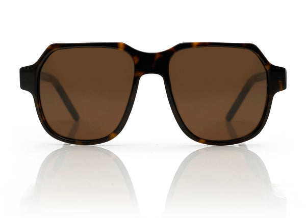 DAKOTA - Dark Tort with Brown Lens. A modern interpretation of the retro aviator frame. Reimagined into a lightweight, small to medium sized style, suitable for smaller faces shapes with its compact dimensions. Carl Zeiss CR39 brown lenses with an anti-scratch coating 100% UVA/UVB protection.
