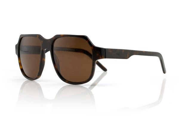 DAKOTA - Dark Tort with Brown Lens. A modern interpretation of the retro aviator frame. Reimagined into a lightweight, small to medium sized style, suitable for smaller faces shapes with its compact dimensions. Carl Zeiss CR39 brown lenses with an anti-scratch coating 100% UVA/UVB protection.