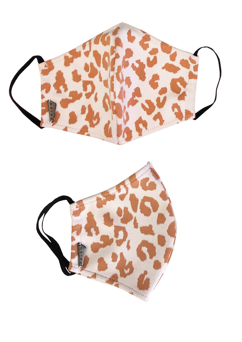 MASK - Caramel Leopard. Masks handmade in Italy using excess swimwear material, for sustainability. All fabric is breathable and water resistant. Every mask has its own unique design and fabric. Protect yourself, your loved ones, and the environment. This fabric is a lightweight, traditional swim fabric.