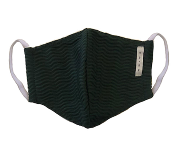 KIDS MASK - Green Waves. Masks handmade in Italy using excess swimwear material, for sustainability. All fabric is breathable and water resistant. Every mask has its own unique design and fabric. Protect yourself, your loved ones, and the environment. This fabric is a lightweight, traditional swim fabric. 
